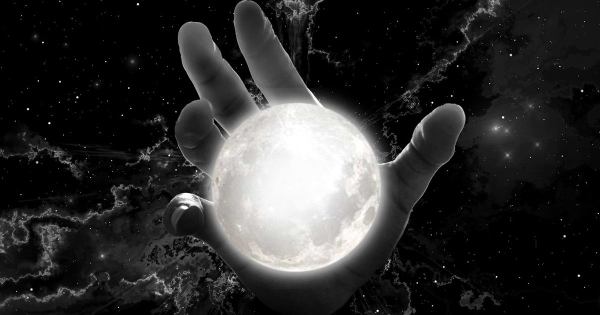 An enormous, celestial-sized hand holds a glowing planet in its palm amid a grayscale interstellar scene full of nebulae and stars—evocative of one's desire to know everything, and to become a master of life.